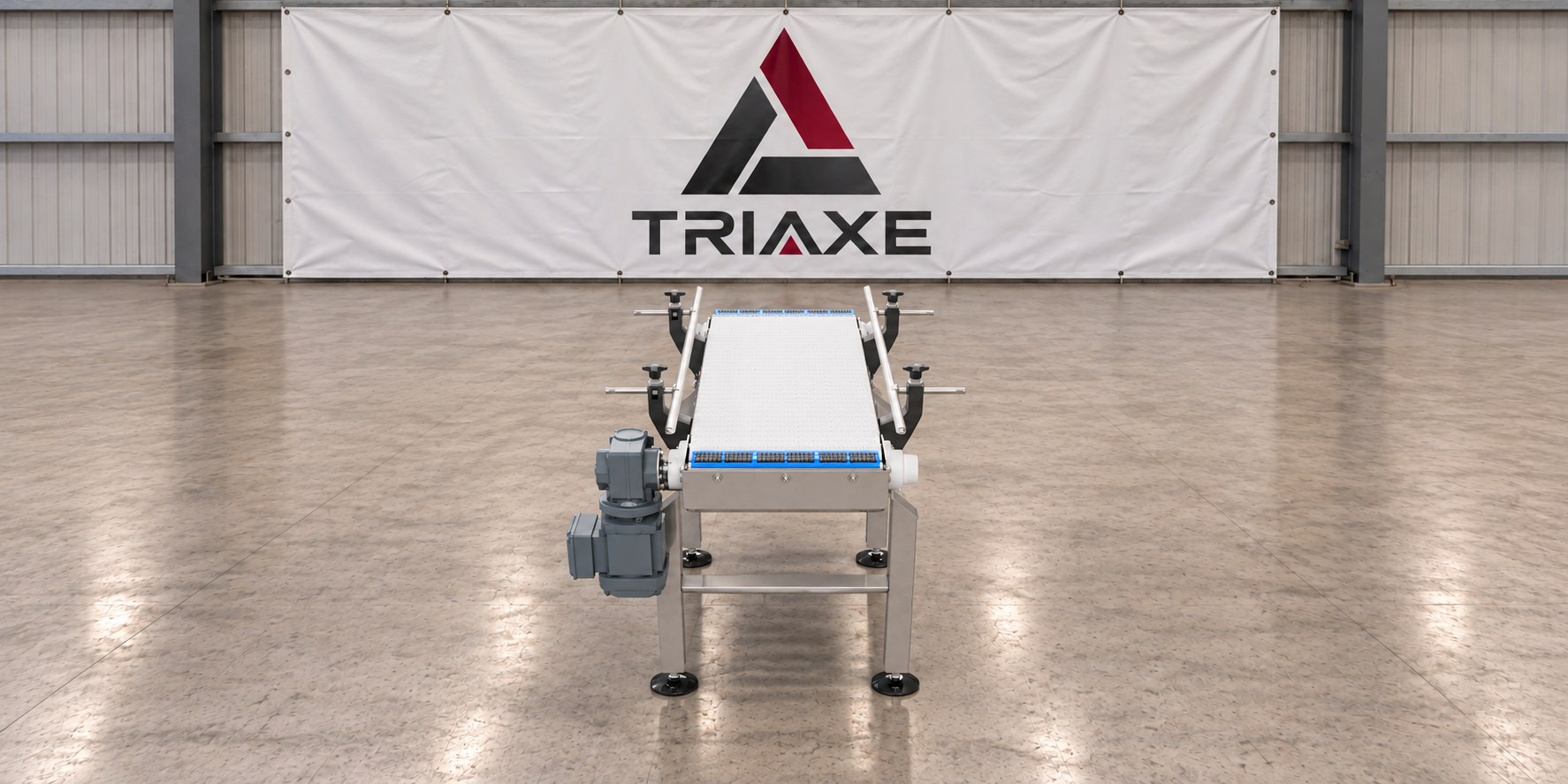 Conveyor modular W14INL100 vista frontal en taller TRIAXE